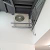Colocación de Condensador en Edificio