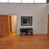Mantenimiento a puertas y piso de madera de encino.