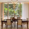Fotografía de interiores de residencia de lujo, luz natural de jardín.